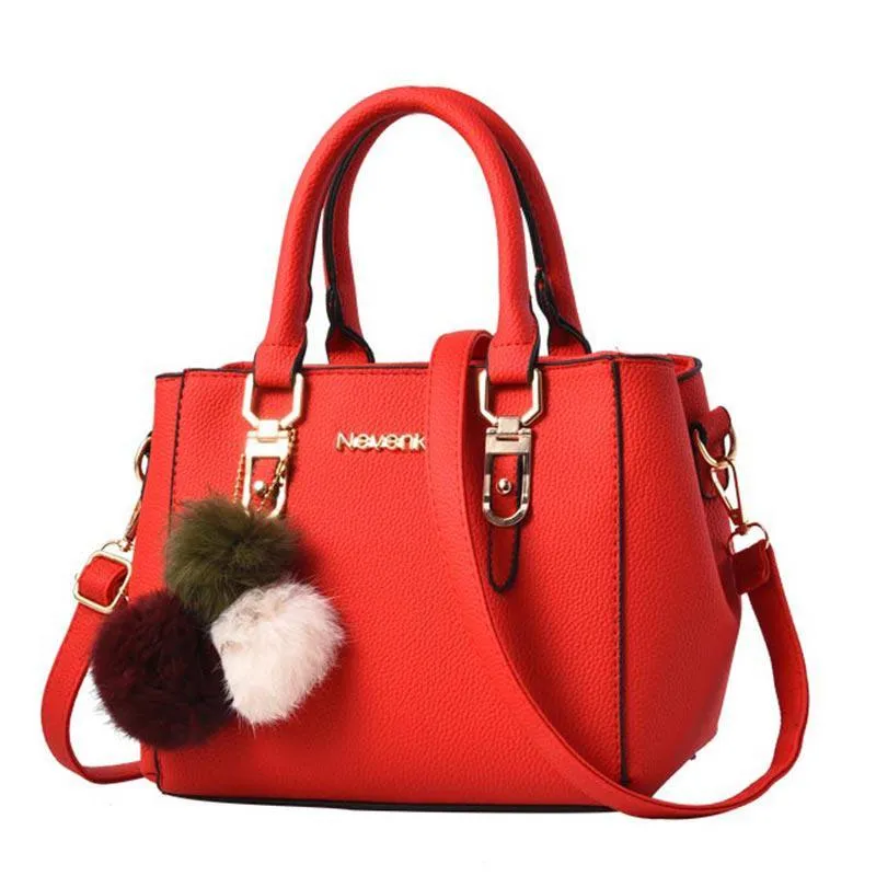 Elegant Handbag With Pompoms