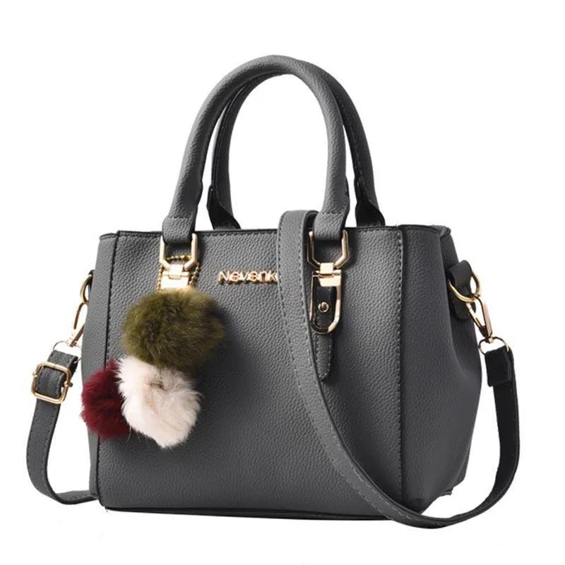 Elegant Handbag With Pompoms